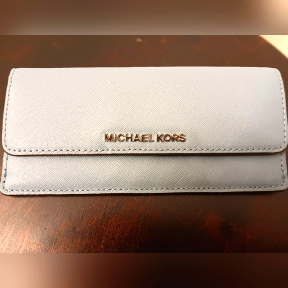 Michael Kors- Saffiano blue leather, snap closure wallet. Lightly used